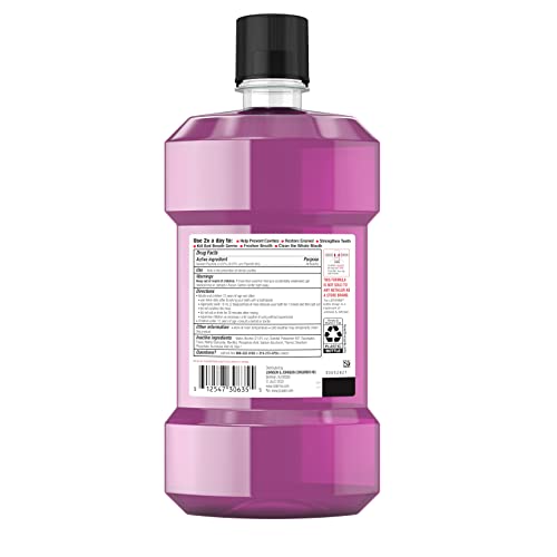 Listerine Total Care Anticavity Fluoride Mouthwash, Kills 99.9% of Germs That Cause Bad Breath and Prevents Cavities, Fresh Mint Flavor, 1L (Pack of 2)