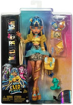 Monster High Cleo De Nile Doll in Golden Blouse & Layered Skirt, Includes Pet Cobra Hissette & Accessories Like a Backpack, Snack & Scroll