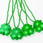 YAXINRUI 4pcs Light Up Shamrocks Beads Necklaces, St. Patrick's Day Accessories - Led Metallic Green Bead Clovers for Irish Party Favor Supplies