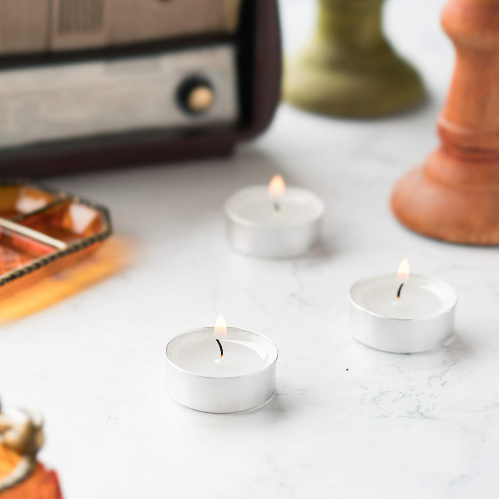 HomeLights Tealight Candles - 4 Hours - Giant 100,200,300 Bulk Packs - White Unscented European Votive Smokeless Tea Lights for Shabbat, Weddings, Christmas, Home Decorative - 200 Pack