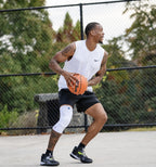 Bauerfeind Sports Compression Knee Support NBA - Lightweight Design with Gripping Zones for Basketball Knee Pain Relief & Performance with Team Designs (Black, M)