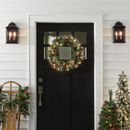 National Tree Company Pre-Lit Artificial Christmas Wreath, Green, Crestwood Spruce, White Lights, Decorated with Pine Cones, Berry Clusters, Christmas Collection, 24 Inches